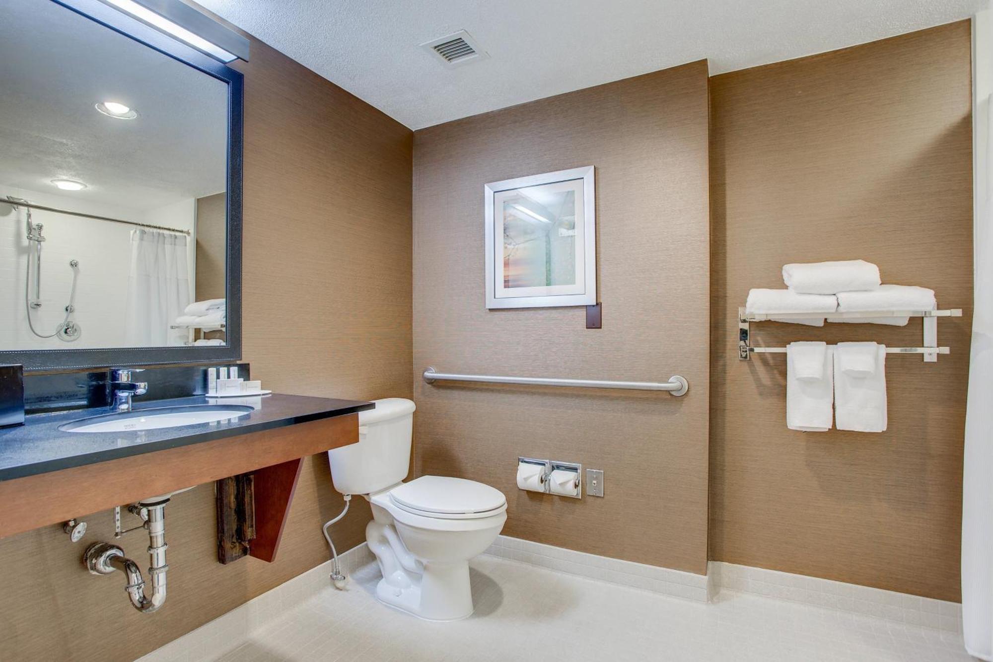 Queen Room Roll Shower Mobility Access or Hearing Accessible