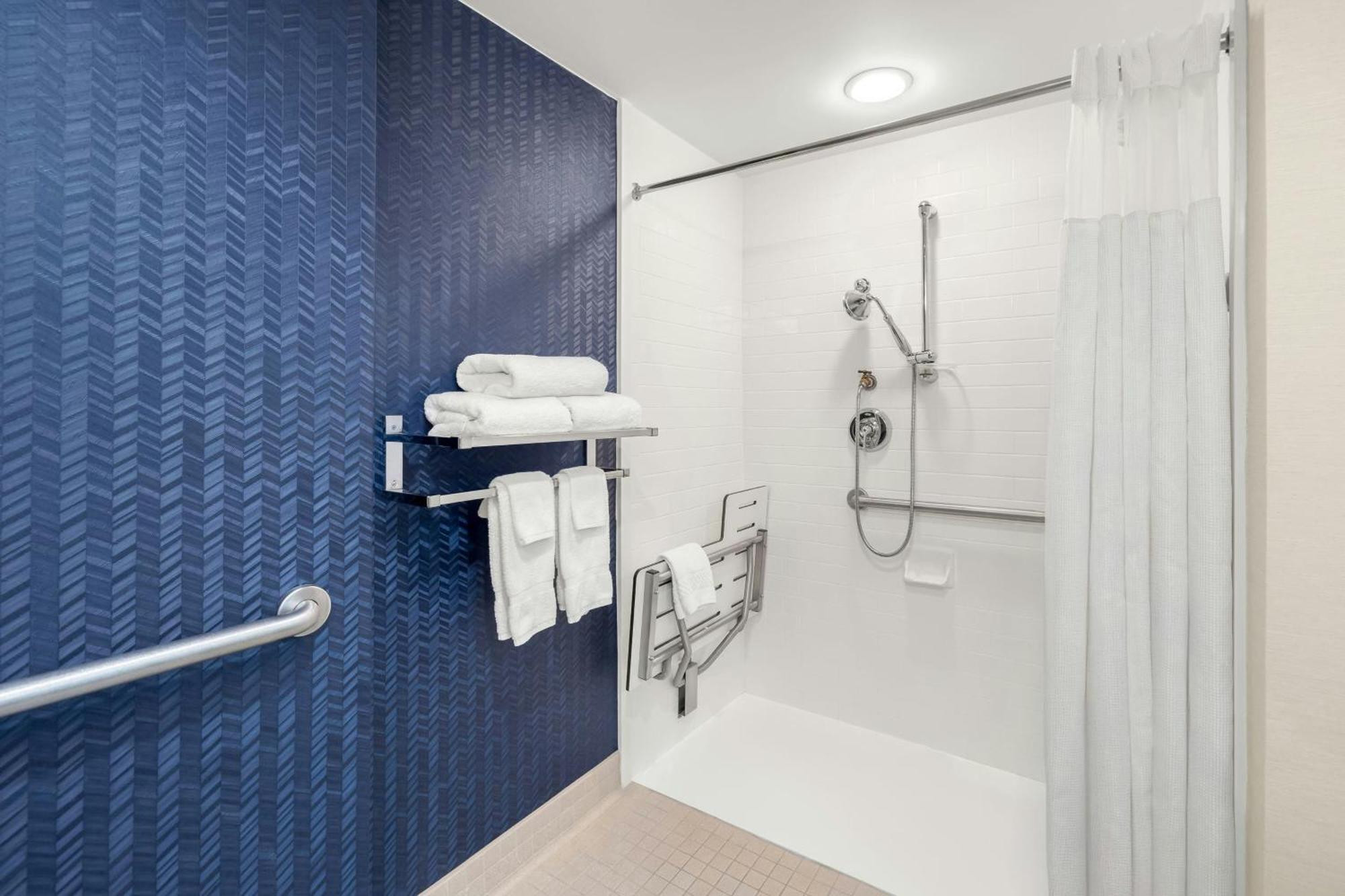 Queen Room Roll Shower Mobility Access or Hearing Accessible